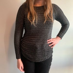 •Black knitted sweater